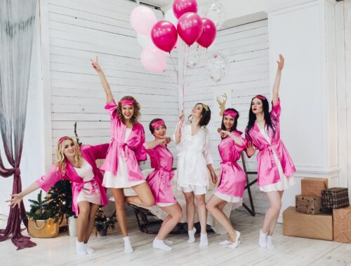 Bridesmaids and bride having fun at bachelorette party