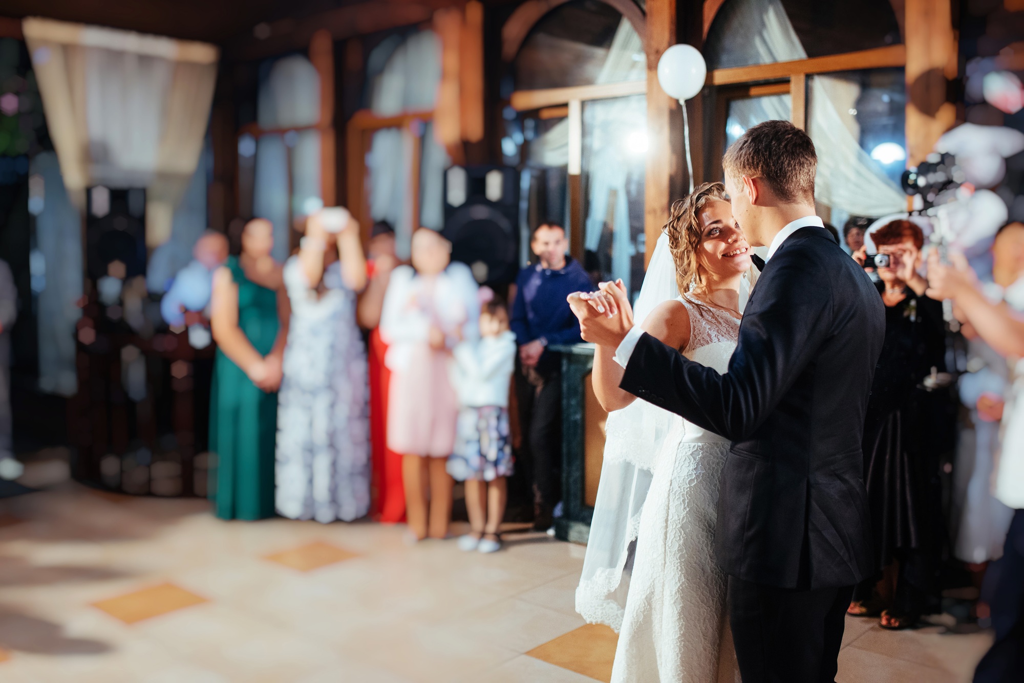 Happy bride and groom a their first dance, wedding