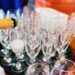 Pour champagne into glasses at wedding party