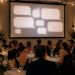 découvrez comment un écran de projection peut afficher en temps réel les messages de vos invités lors de votre réception, créant une ambiance interactive et mémorable.